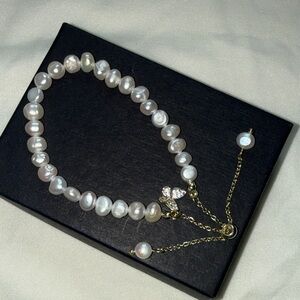 Elegant Pearl Bracelet with Butterfly Charm